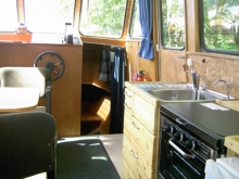 Barka turystyczna Huuha - czarter barek w Finlandi - Pojezierze Fińskie foto: Saimaan Solmu